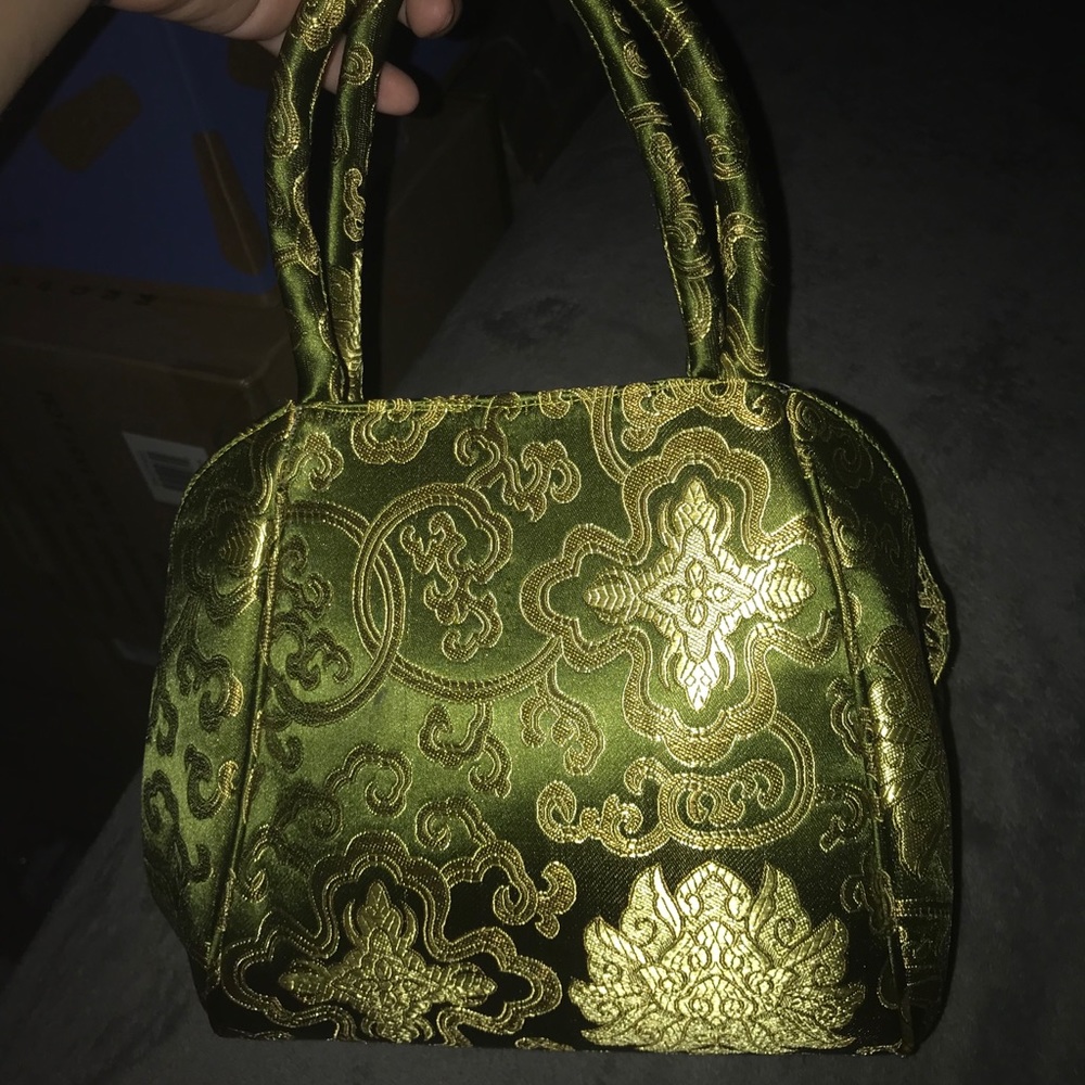 A green vintage cloth purse